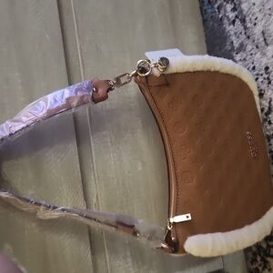 Peony Logo small hobo Guess bag.